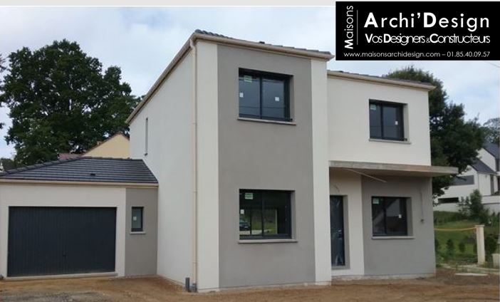 Maison Ema en L enduit biton menuiseries gris anthracite 7016 porche béton 4 pans effet toit plat dans les yvelines archidesign