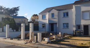 Maison porche rentrant contemporaine tuile noire sous sol dans les yvelines archidesign