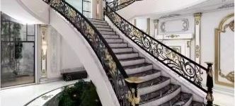 constructeur escalier marbre et garde corps en fer forgé